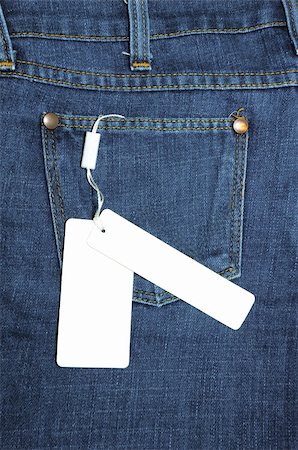 packing fabric - label tied to the blue jeans Stock Photo - Budget Royalty-Free & Subscription, Code: 400-04854637