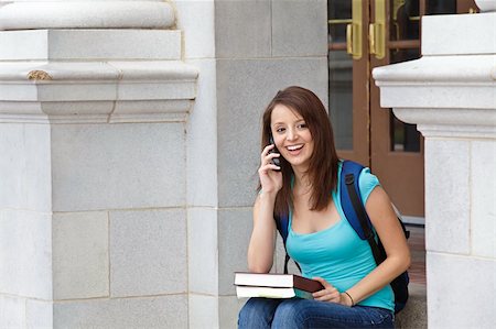 simsearch:400-04854970,k - Young woman on cell phone at school Stock Photo - Budget Royalty-Free & Subscription, Code: 400-04854971