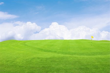 simsearch:400-04319321,k - Landscape of a green golf course with sky.Shallow focus. Photographie de stock - Aubaine LD & Abonnement, Code: 400-04855458