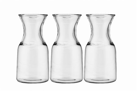 simsearch:400-04997063,k - Three glass jugs arranged on white background Photographie de stock - Aubaine LD & Abonnement, Code: 400-04855798