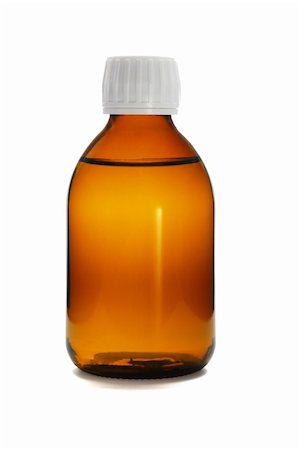 Liquid medicine in glass bottle on white background Stock Photo - Budget Royalty-Free & Subscription, Code: 400-04855873