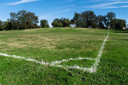 football field border - green empty football field in public park Stock Photo - Budget Royalty-Free & Subscription, Code: 400-04856533