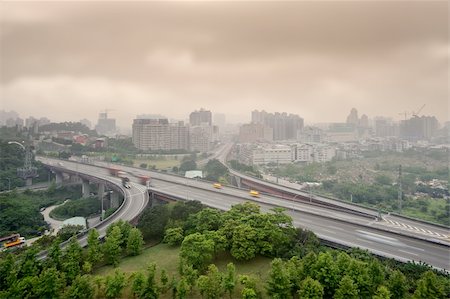 simsearch:400-04763398,k - Sunset cityscape of highway and buildings with bad weather and air pollution, city scenery in Taipei, Taiwan. Stock Photo - Budget Royalty-Free & Subscription, Code: 400-04856562