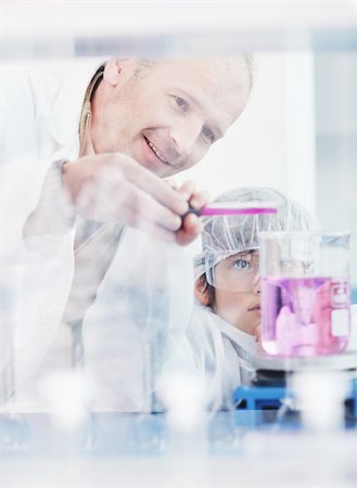 scientist and teacher photo - science and chemistry classes with teacher and young school boy at bright lab Stock Photo - Budget Royalty-Free & Subscription, Code: 400-04856954