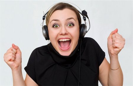 a young girl listens music emotionally Stockbilder - Microstock & Abonnement, Bildnummer: 400-04857227