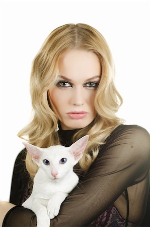 beauty young blond woman with oriental shorthair cat on a white Stock Photo - Budget Royalty-Free & Subscription, Code: 400-04857462
