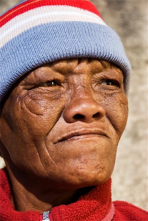 photographic portraits poor people - Old African woman against a grunge background Stock Photo - Budget Royalty-Free & Subscription, Code: 400-04857513