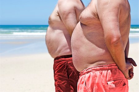 simsearch:400-06108048,k - Close up of two obese fat men of the beach Stockbilder - Microstock & Abonnement, Bildnummer: 400-04857544