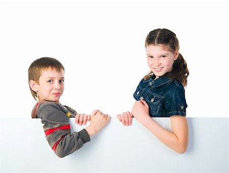 simsearch:695-05773921,k - Happy Kids Sister and Brother. Isolated on a white background Photographie de stock - Aubaine LD & Abonnement, Code: 400-04857558