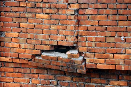 Rupture of red brick faced with dumping Stock Photo - Budget Royalty-Free & Subscription, Code: 400-04858212