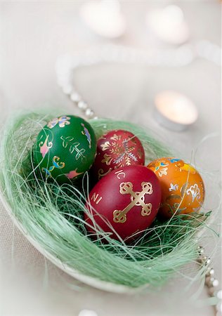 reich (artist) - colored Easter eggs with decoration and candles Fotografie stock - Microstock e Abbonamento, Codice: 400-04858502