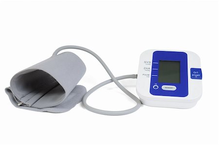 Electronic automatic tonometer for control of arterial pressure, isolated on white bacground Stock Photo - Budget Royalty-Free & Subscription, Code: 400-04858990