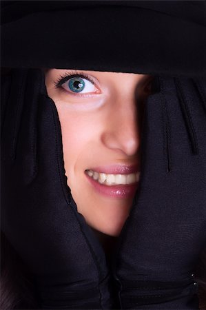 simsearch:400-05164576,k - Portrait of a beautiful brunette young woman with gloves and black hat Stock Photo - Budget Royalty-Free & Subscription, Code: 400-04850173