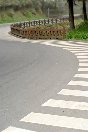 simsearch:400-05255892,k - Zebra crossing in beautiful curve on road in forest in Alishan National Scenic Area, Taiwan, Asia. Photographie de stock - Aubaine LD & Abonnement, Code: 400-04850216