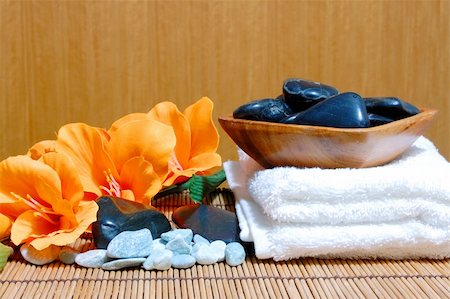 simsearch:400-08786501,k - spa and wellness concept with flowers zen stones and towel Photographie de stock - Aubaine LD & Abonnement, Code: 400-04850299