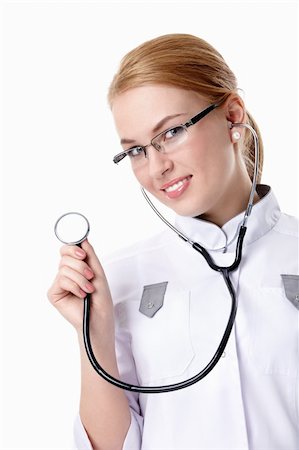 simsearch:400-04375768,k - Attractive nurse with a stethoscope on a white background Foto de stock - Royalty-Free Super Valor e Assinatura, Número: 400-04850617