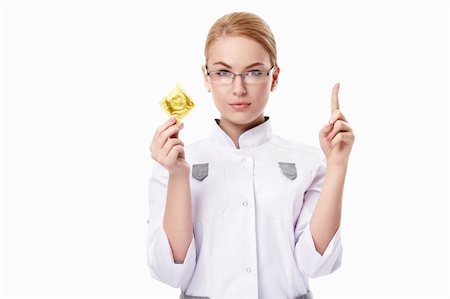 rubber nurse - A young doctor with a condom on a white background Stock Photo - Budget Royalty-Free & Subscription, Code: 400-04850625