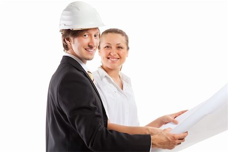 shirt technical sketch - An architect wearing a hard hat and co-worker reviewing blueprints Stock Photo - Budget Royalty-Free & Subscription, Code: 400-04850716