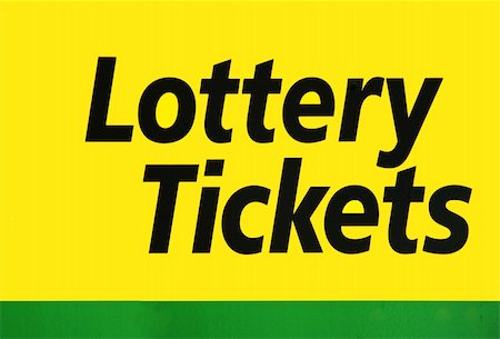 A yellow lottery tickets sign Foto de stock - Super Valor sin royalties y Suscripción, Código: 400-04850907