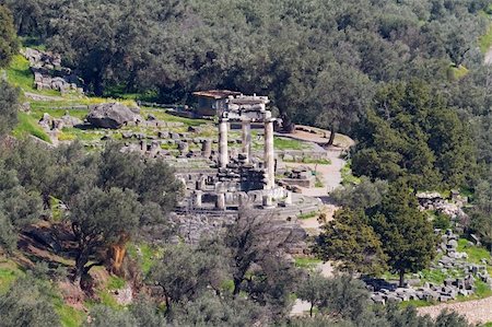 The Athena Pronaia Sanctuary (with Tholos in the middle of it) at Delphi, Greece Stock Photo - Budget Royalty-Free & Subscription, Code: 400-04851194