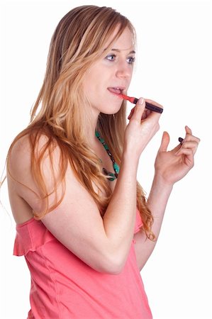 strotter13 (artist) - A girl is applying chapstick.  She is in a very colorful outfit. Photographie de stock - Aubaine LD & Abonnement, Code: 400-04851235