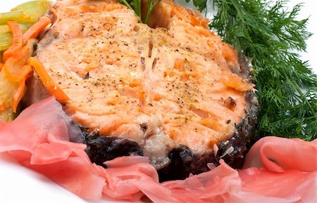simsearch:400-06358844,k - Grilled salmon steak on bed of mixed greens and ginger Photographie de stock - Aubaine LD & Abonnement, Code: 400-04852311