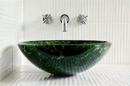 simsearch:622-02355166,k - Modern style greean marble vessel sink with wall mount faucets on bright white corrugated tiles. Stock Photo - Budget Royalty-Free & Subscription, Code: 400-04852538