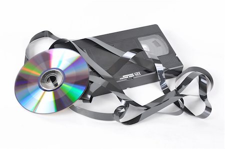 ruslan5838 (artist) - Picture of video cassettes and disk on a white background Stock Photo - Budget Royalty-Free & Subscription, Code: 400-04852733