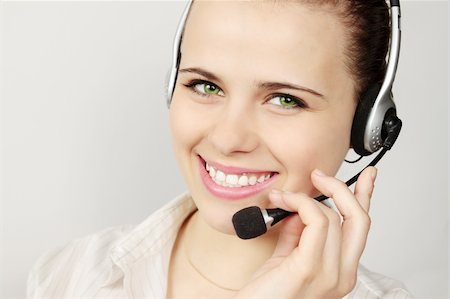 simsearch:400-04233879,k - Support phone operator in headset on gray Photographie de stock - Aubaine LD & Abonnement, Code: 400-04853072