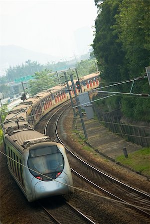 simsearch:400-07550750,k - Modern passenger train and railway in hong kong Foto de stock - Super Valor sin royalties y Suscripción, Código: 400-04853568