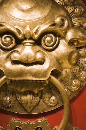 It is chinese style   lionhead knocker door Stock Photo - Budget Royalty-Free & Subscription, Code: 400-04853781