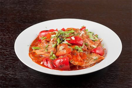 simsearch:400-09019204,k - pork meat with tomato, pepper, prunes, garlic and green onion Stock Photo - Budget Royalty-Free & Subscription, Code: 400-04864114