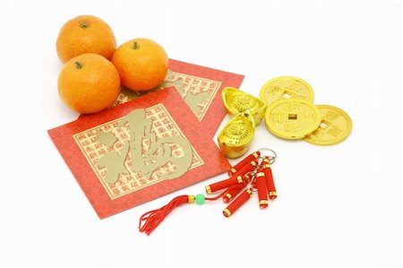 Chinese New Year ornaments, oranges and red packets on white background Stock Photo - Budget Royalty-Free & Subscription, Code: 400-04864799