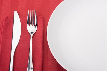 simsearch:400-08628418,k - Knife and fork on a napkin as a dining room serving. Stock Photo - Budget Royalty-Free & Subscription, Code: 400-04865795