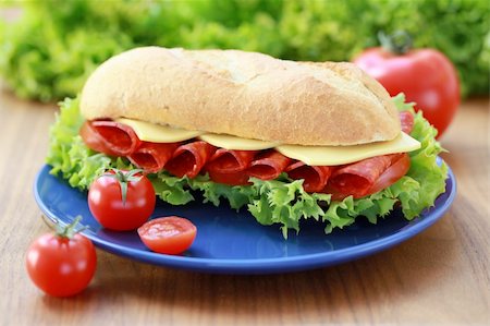 simsearch:400-04416282,k - Closeup of a fresh sub with Chorizo Salami, cheese and tomatoes Stock Photo - Budget Royalty-Free & Subscription, Code: 400-04865851