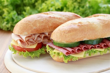 simsearch:400-06421213,k - Closeup of two fresh sandwiches with salami and ham Foto de stock - Super Valor sin royalties y Suscripción, Código: 400-04865853