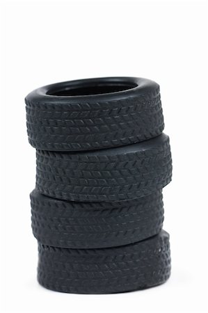 pile tires - A stack of toy tires isolated on the white Stock Photo - Budget Royalty-Free & Subscription, Code: 400-04866310