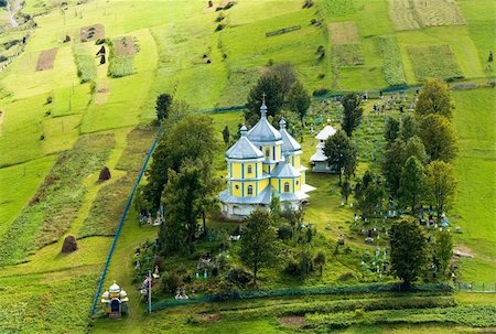 Beautiful small mountain village church on mountainside (Carpathian. Ukraine) Stock Photo - Budget Royalty-Free & Subscription, Code: 400-04866524