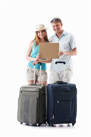 empty suitcase - Young couple with suitcases and an empty plate isolated Foto de stock - Super Valor sin royalties y Suscripción, Código: 400-04866932