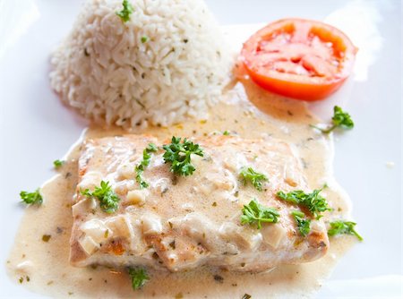 poached salmon - grilled salmon and lemon - french cuisine dish with tomato and salmon Stock Photo - Budget Royalty-Free & Subscription, Code: 400-04866942