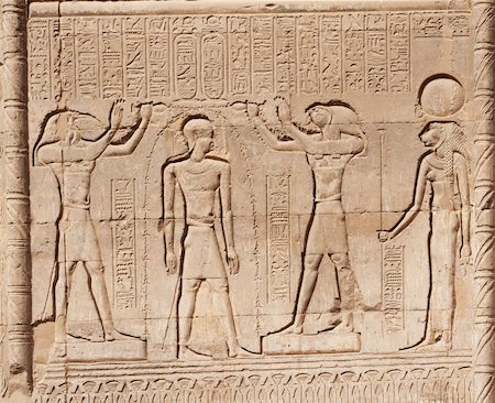 simsearch:400-05739807,k - Hieroglyphic carvings on a wall at the Egyptian Temple of Khnum in Esna Foto de stock - Super Valor sin royalties y Suscripción, Código: 400-04867417