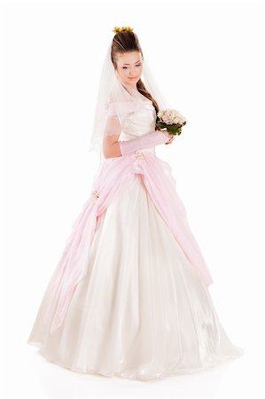simsearch:400-06694116,k - Beautiful woman dressed as a bride over white background Photographie de stock - Aubaine LD & Abonnement, Code: 400-04867608