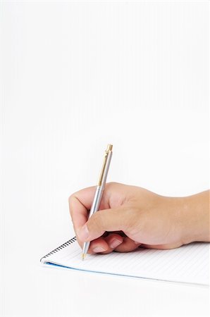 A hand holding a pen to write on a notepad isolated with white background Stock Photo - Budget Royalty-Free & Subscription, Code: 400-04868012