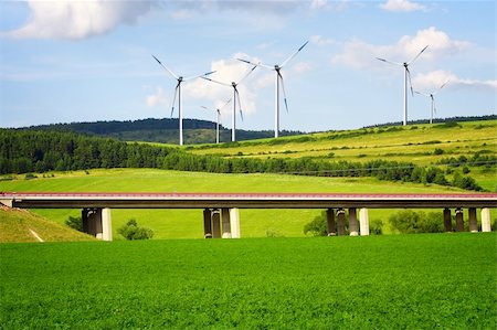 eco travel - Wind turbines over the highway Stock Photo - Budget Royalty-Free & Subscription, Code: 400-04868083