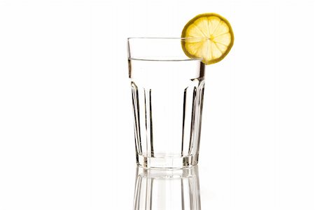 glass of mineral water with lemon on white Stock Photo - Budget Royalty-Free & Subscription, Code: 400-04868465