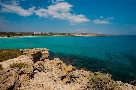 Sea view of clear water on the beach of Cyprus Fotografie stock - Microstock e Abbonamento, Codice: 400-04868622