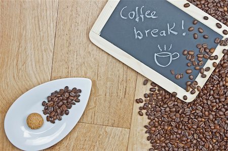 Coffee beans with cookies on a white plate and a board Stock Photo - Budget Royalty-Free & Subscription, Code: 400-04868703
