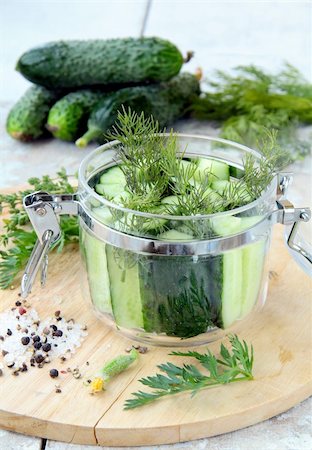 spice gardens - cucumbers in the jar with dill salt and pepper on the table Stock Photo - Budget Royalty-Free & Subscription, Code: 400-04868765