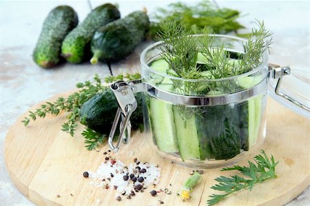 simsearch:400-04849937,k - cucumbers in the jar with dill salt and pepper on the table Stock Photo - Budget Royalty-Free & Subscription, Code: 400-04868766
