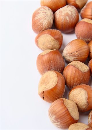 simsearch:400-05265990,k - hazelnuts lined with a heart on a white background Stock Photo - Budget Royalty-Free & Subscription, Code: 400-04869289